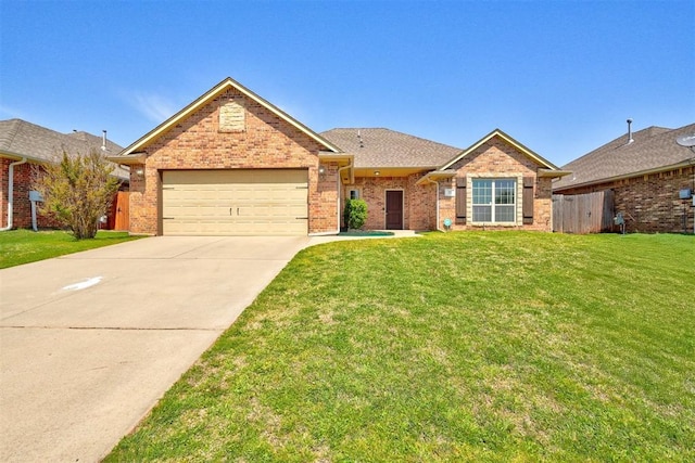 73 Bonaire Dr, Edmond, OK 73013 - ranch-style house with an attached garage, concrete driveway, a front lawn, and brick siding