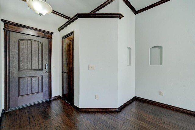 73 Bonaire Dr, Edmond, OK 73013 - entrance foyer featuring ornamental molding, dark wood-style floors, and baseboards