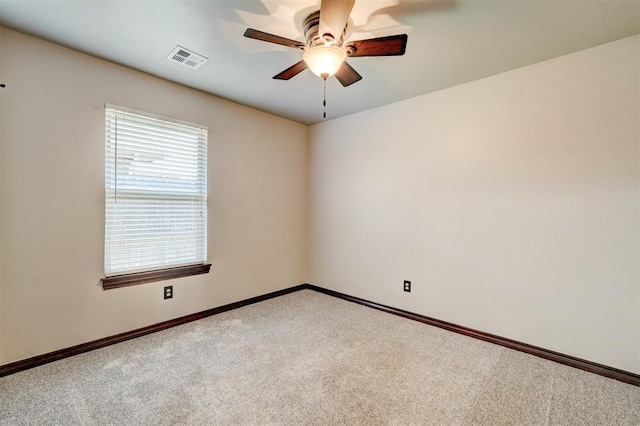 73 Bonaire Dr, Edmond, OK 73013 - empty room with carpet, ceiling fan, and baseboards