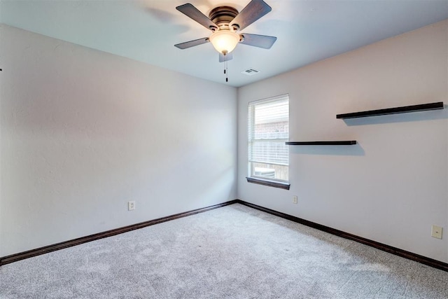 73 Bonaire Dr, Edmond, OK 73013 - carpeted spare room with a ceiling fan and baseboards