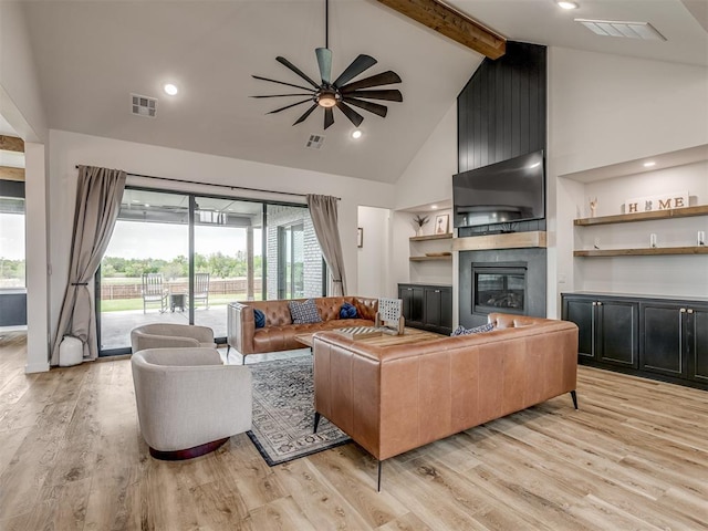 1330 Acclivis Ct, Newcastle, OK 73065 - living room with beamed ceiling, visible vents, and a wealth of natural light