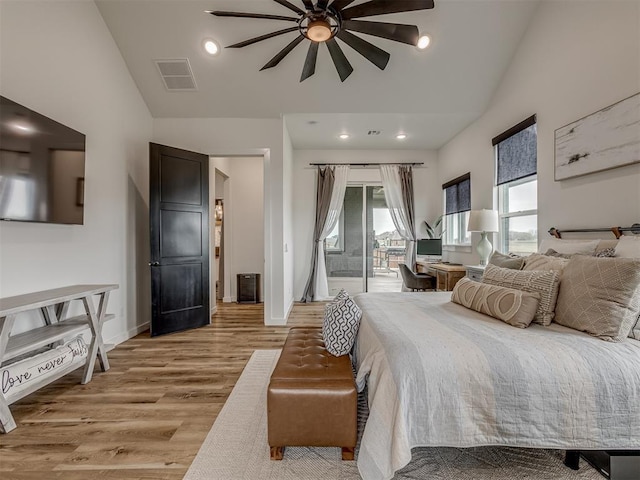 1330 Acclivis Ct, Newcastle, OK 73065 - bedroom with visible vents, access to exterior, light wood-type flooring, and lofted ceiling