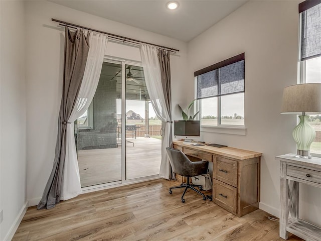 1330 Acclivis Ct, Newcastle, OK 73065 - home office with light wood-style flooring, baseboards, and a ceiling fan