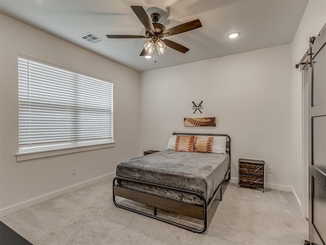 1330 Acclivis Ct, Newcastle, OK 73065 - carpeted bedroom with recessed lighting, baseboards, visible vents, and a barn door