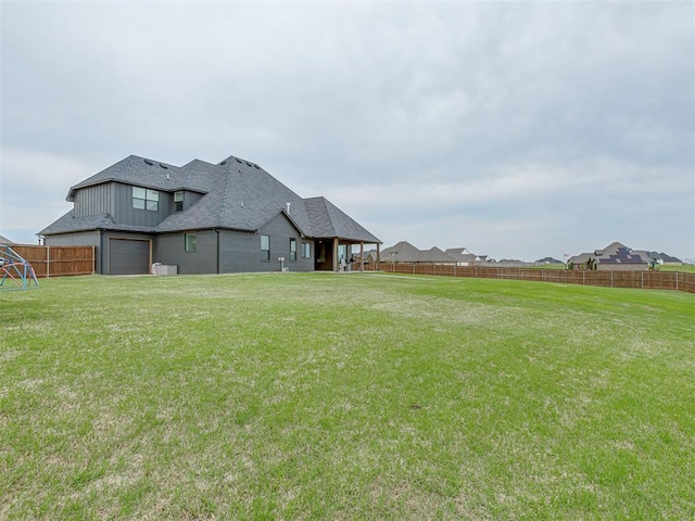 1330 Acclivis Ct, Newcastle, OK 73065 - view of yard with a garage and fence private yard