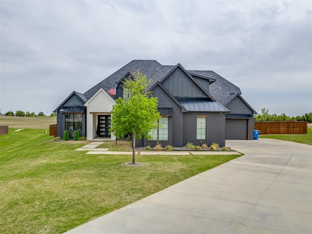 1330 Acclivis Ct, Newcastle, OK 73065 - view of front of home with a standing seam roof, a front yard, driveway, and metal roof