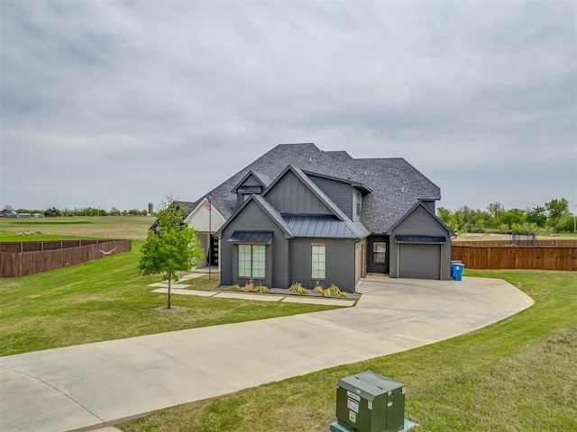 1330 Acclivis Ct, Newcastle, OK 73065 - view of front facade with a front yard, a standing seam roof, metal roof, a garage, and driveway