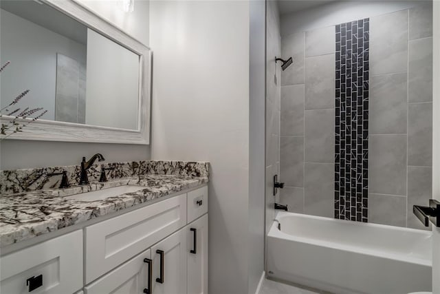 bathroom with vanity and  shower combination