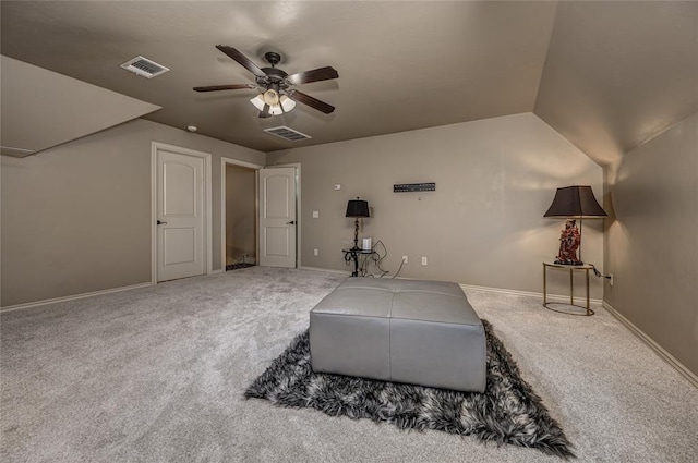 sitting room with baseboards, a ceiling fan, visible vents, and carpet floors