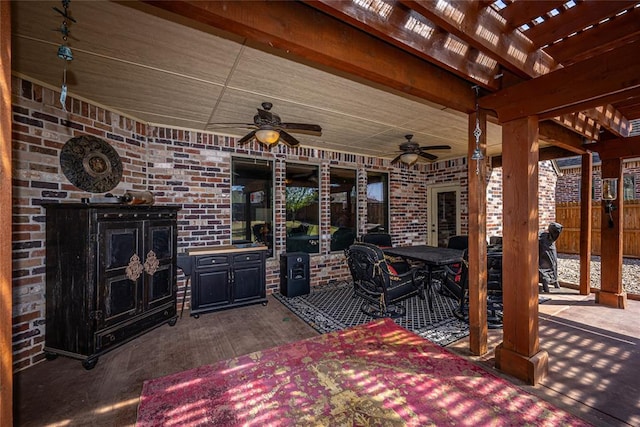view of patio featuring fence, a pergola, ceiling fan, and outdoor dining area