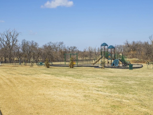 community play area featuring a lawn