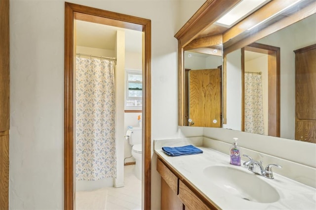 10404 Durham Dr, Oklahoma City, OK 73162 - bathroom with toilet and vanity