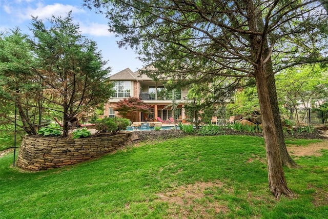 3920 Creek Bank Dr, Edmond, OK 73003 - view of grassy yard featuring a balcony and an outdoor pool
