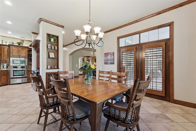 3920 Creek Bank Dr, Edmond, OK 73003 - dining room featuring crown molding, a chandelier, arched walkways, recessed lighting, and light tile patterned floors