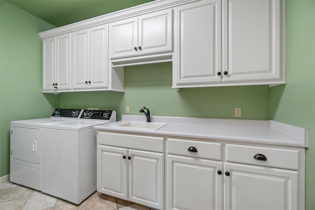 3920 Creek Bank Dr, Edmond, OK 73003 - laundry room featuring cabinet space and independent washer and dryer