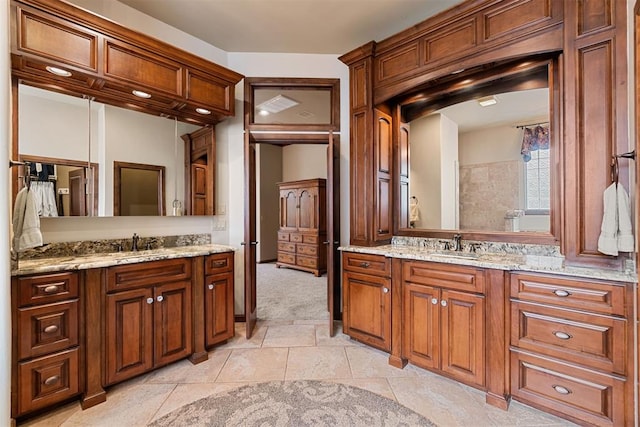 3920 Creek Bank Dr, Edmond, OK 73003 - bathroom with two vanities and tile patterned flooring