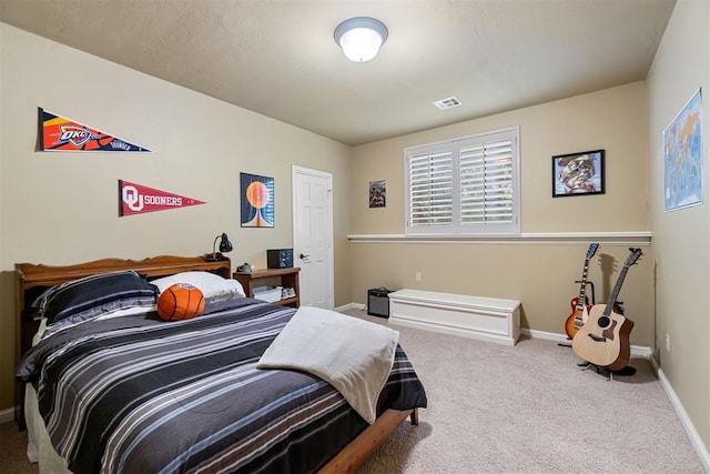 3920 Creek Bank Dr, Edmond, OK 73003 - bedroom featuring baseboards and carpet