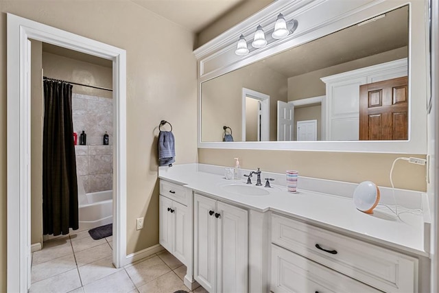 3920 Creek Bank Dr, Edmond, OK 73003 - full bathroom with tile patterned flooring, vanity, and shower / bath combination with curtain