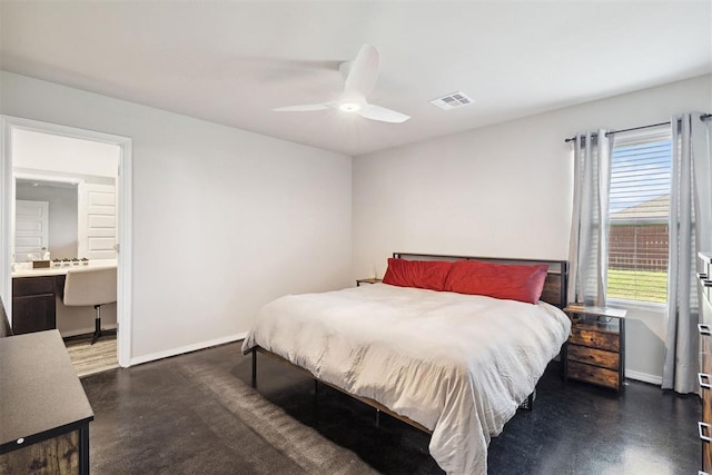 bedroom with ensuite bathroom, concrete floors, a ceiling fan, visible vents, and baseboards