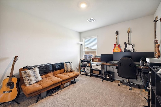carpeted office space featuring visible vents