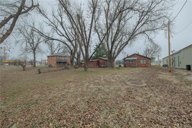 1319 S Division St, Guthrie, OK 73044 - view of yard with central AC