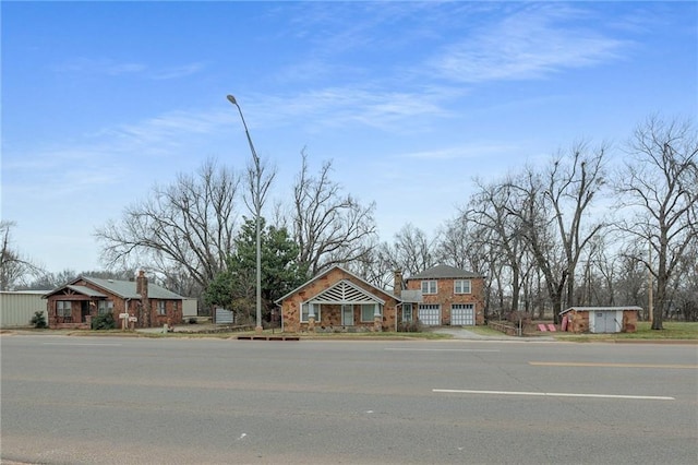 1319 S Division St, Guthrie, OK 73044 - view of front of property with stone siding