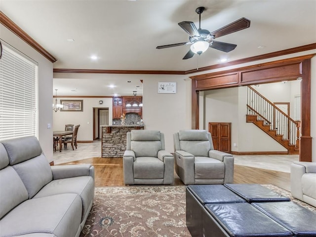 living room with crown molding, recessed lighting, a ceiling fan, and stairway