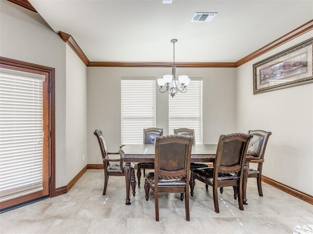 dining space with crown molding, visible vents, baseboards, and a notable chandelier