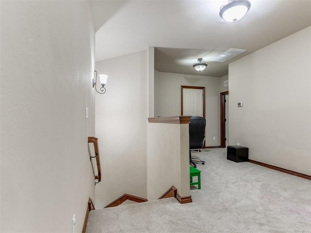 carpeted office with baseboards