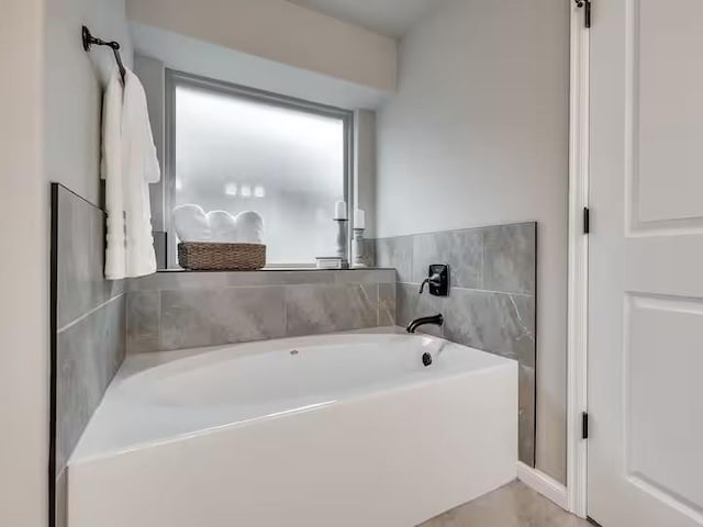 full bathroom with a bath
