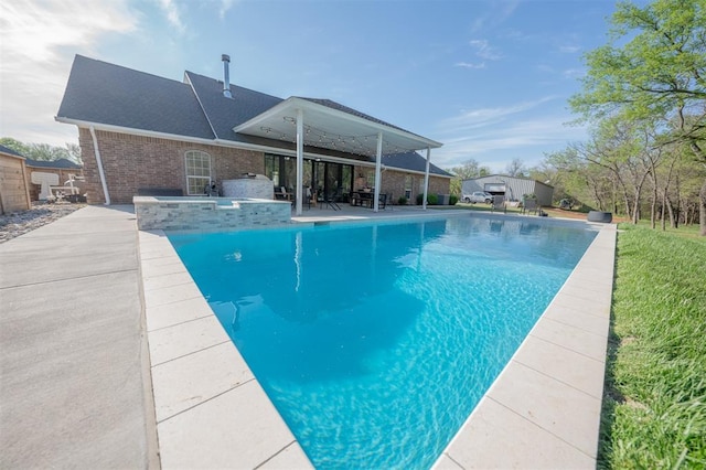 2400 Lost Lake Ln, Yukon, OK 73099 - view of swimming pool with a patio area and a pool with connected hot tub