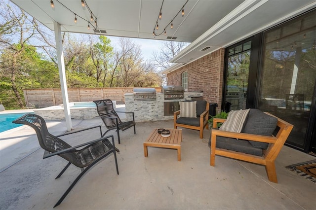 2400 Lost Lake Ln, Yukon, OK 73099 - fenced backyard featuring a patio area and an outdoor living space