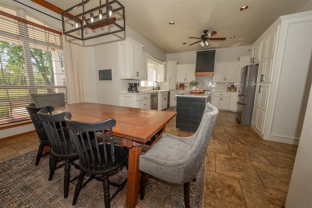 2400 Lost Lake Ln, Yukon, OK 73099 - dining space featuring ceiling fan, dark stone finish flooring, recessed lighting, and a chandelier