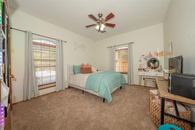 2400 Lost Lake Ln, Yukon, OK 73099 - bedroom with carpet floors and a ceiling fan