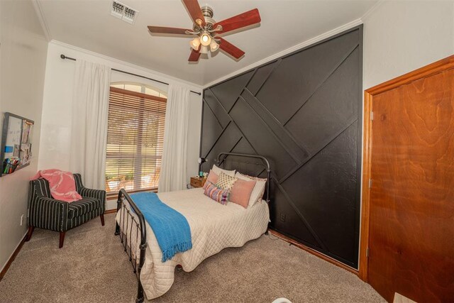 2400 Lost Lake Ln, Yukon, OK 73099 - bedroom with carpet flooring, ornamental molding, ceiling fan, and baseboards