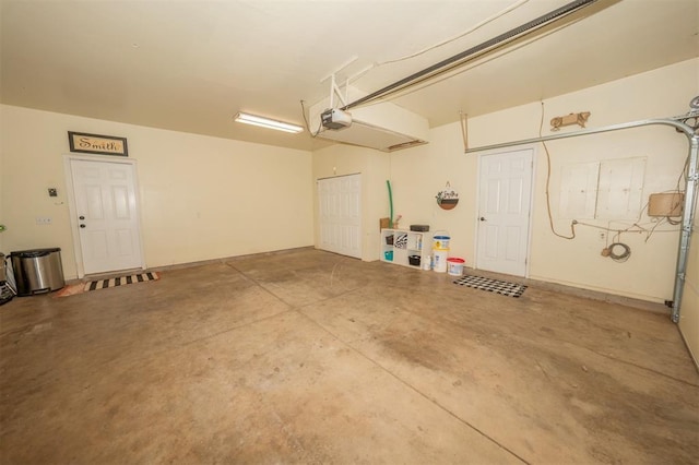 2400 Lost Lake Ln, Yukon, OK 73099 - garage featuring a garage door opener