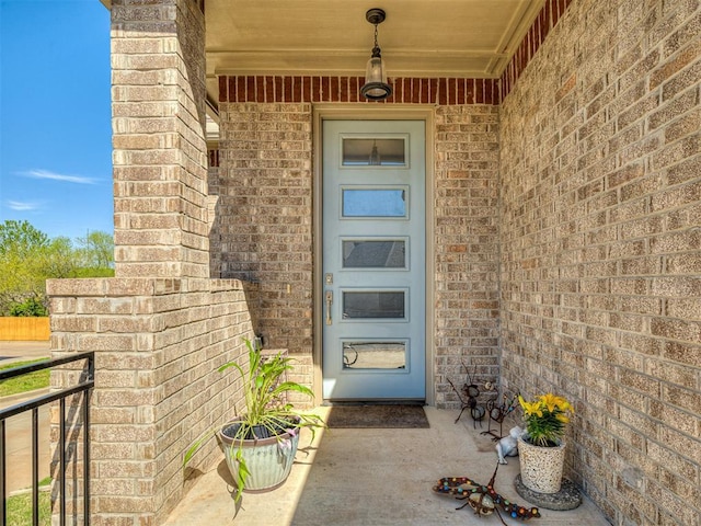 104 Rue De Montserrat, Norman, OK 73071 - view of exterior entry featuring brick siding