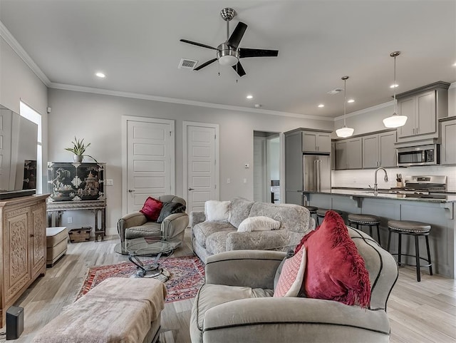 104 Rue De Montserrat, Norman, OK 73071 - living area with crown molding, visible vents, a ceiling fan, and recessed lighting