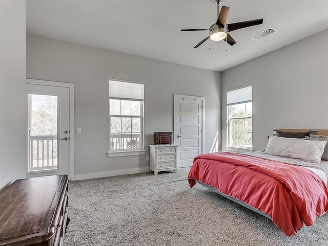 104 Rue De Montserrat, Norman, OK 73071 - carpeted bedroom featuring a ceiling fan, baseboards, multiple windows, and visible vents