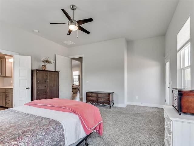 104 Rue De Montserrat, Norman, OK 73071 - bedroom with baseboards, a ceiling fan, and carpet