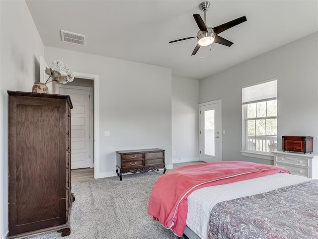 104 Rue De Montserrat, Norman, OK 73071 - carpeted bedroom featuring visible vents, baseboards, and ceiling fan
