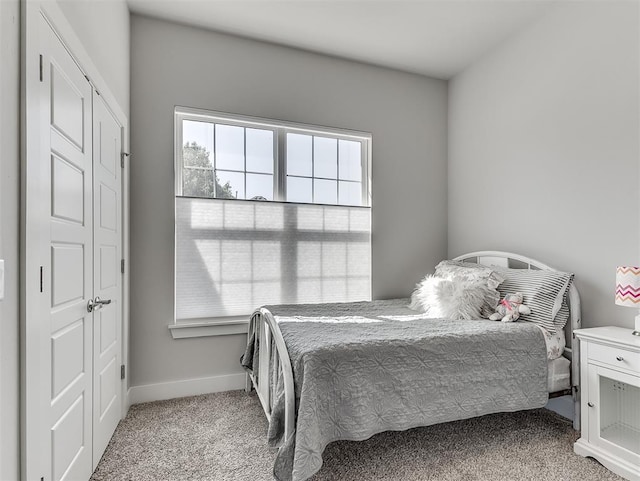 104 Rue De Montserrat, Norman, OK 73071 - bedroom featuring carpet flooring and baseboards