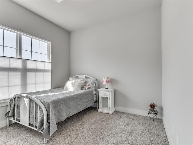 104 Rue De Montserrat, Norman, OK 73071 - bedroom with baseboards and carpet floors