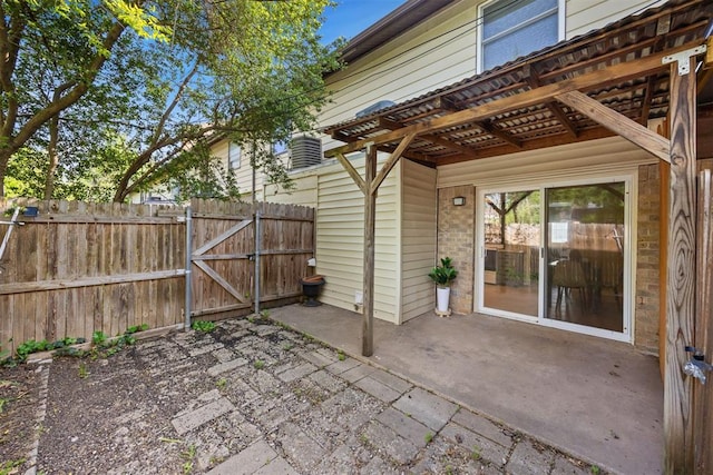 view of patio / terrace with a gate and fence