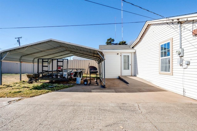 230 SE 50th St, Oklahoma City, OK 73129 - view of vehicle parking with a detached carport and concrete driveway