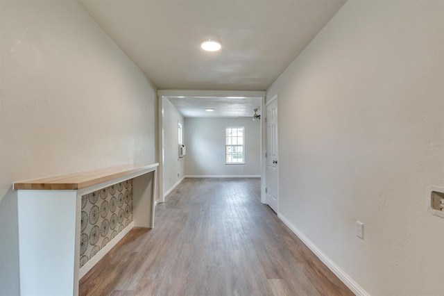 230 SE 50th St, Oklahoma City, OK 73129 - hallway with wood finished floors and baseboards
