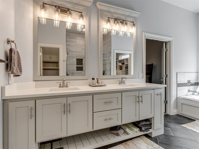 3108 Drake Crest Dr, Edmond, OK 73034 - bathroom featuring double vanity, a sink, and tiled shower