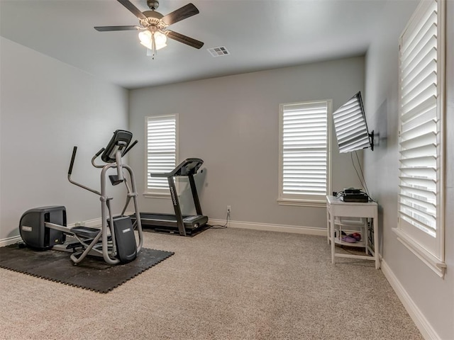 3108 Drake Crest Dr, Edmond, OK 73034 - exercise area featuring baseboards, visible vents, a ceiling fan, and carpet floors