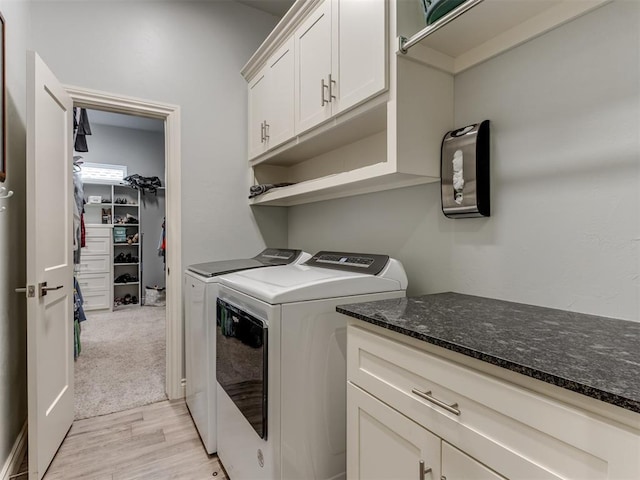 3108 Drake Crest Dr, Edmond, OK 73034 - washroom with cabinet space, light wood-style flooring, and washer and clothes dryer