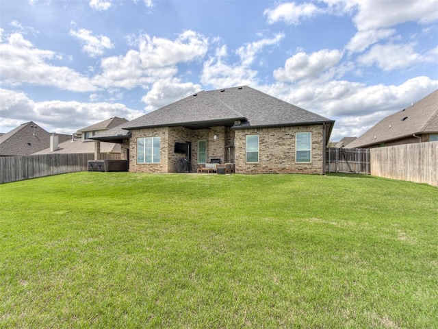 3108 Drake Crest Dr, Edmond, OK 73034 - rear view of property with a lawn, roof with shingles, and a fenced backyard